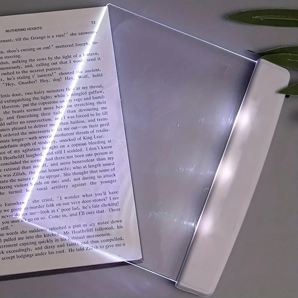 Clear acrylic standover on a book with text