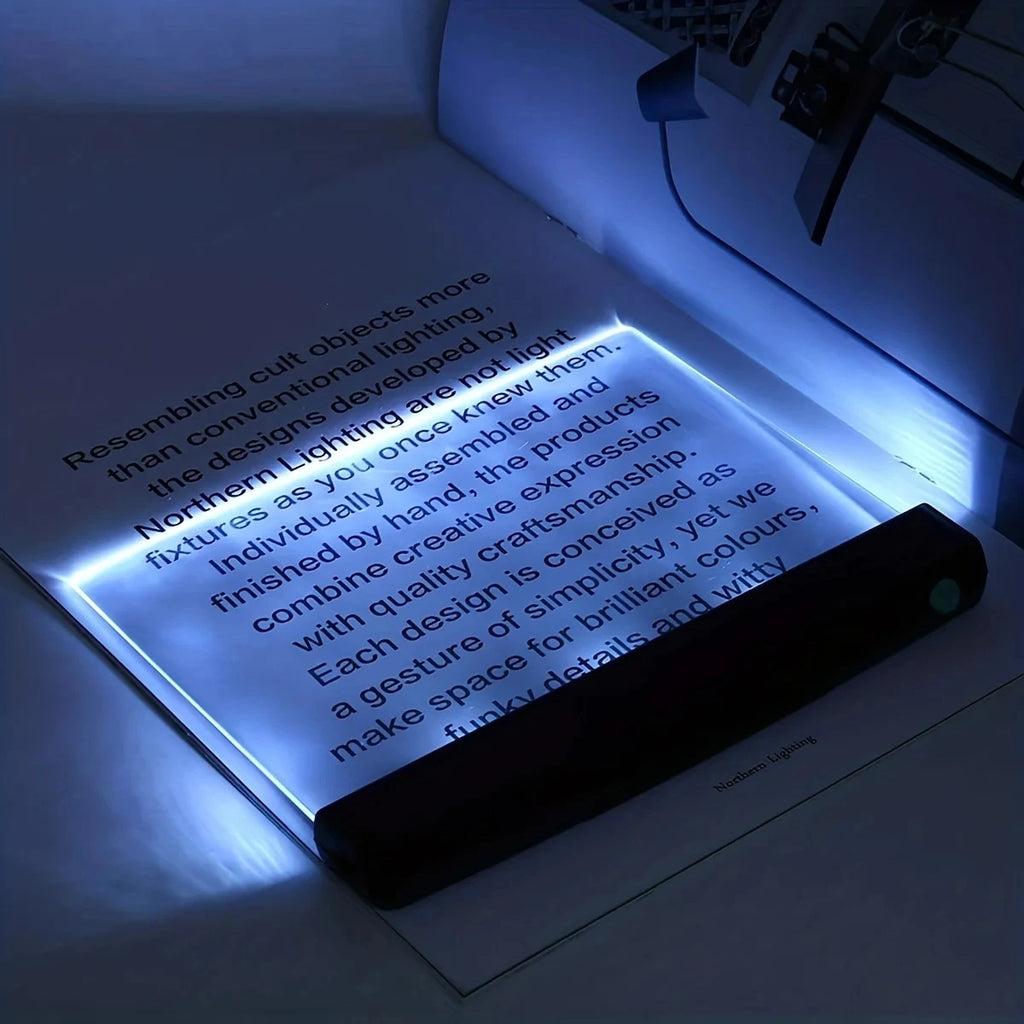 Light-up book with text on a dark background